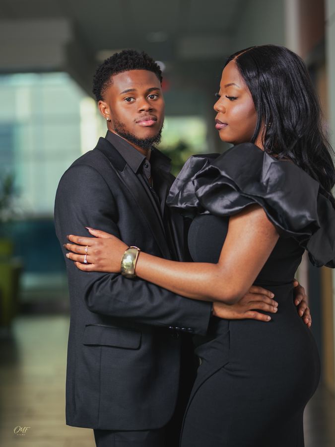 Engaged couple embracing during a portrait session in Regina, Saskatchewan